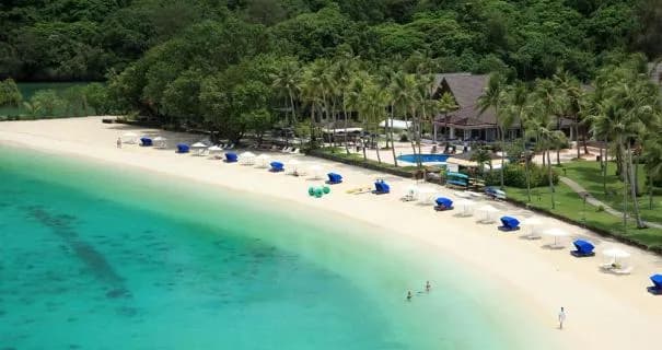 A stretch of white beach at Palau Pacific Resort in Micronesia. A stretch of white beach at Palau Pacific Resort in Micronesia.